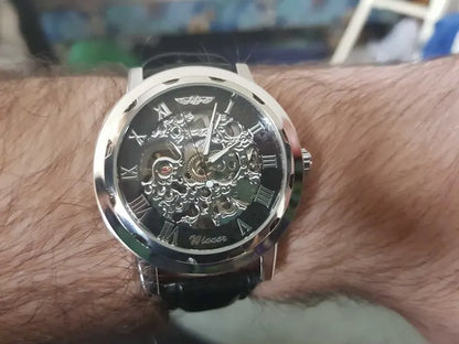Winner Luxury Skeleton Mechanical Watch – Black Leather Strap, Gold Dial, Stainless Steel Case