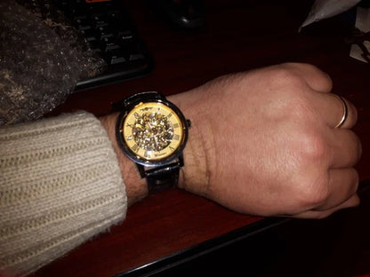 Winner Luxury Skeleton Mechanical Watch – Black Leather Strap, Gold Dial, Stainless Steel Case