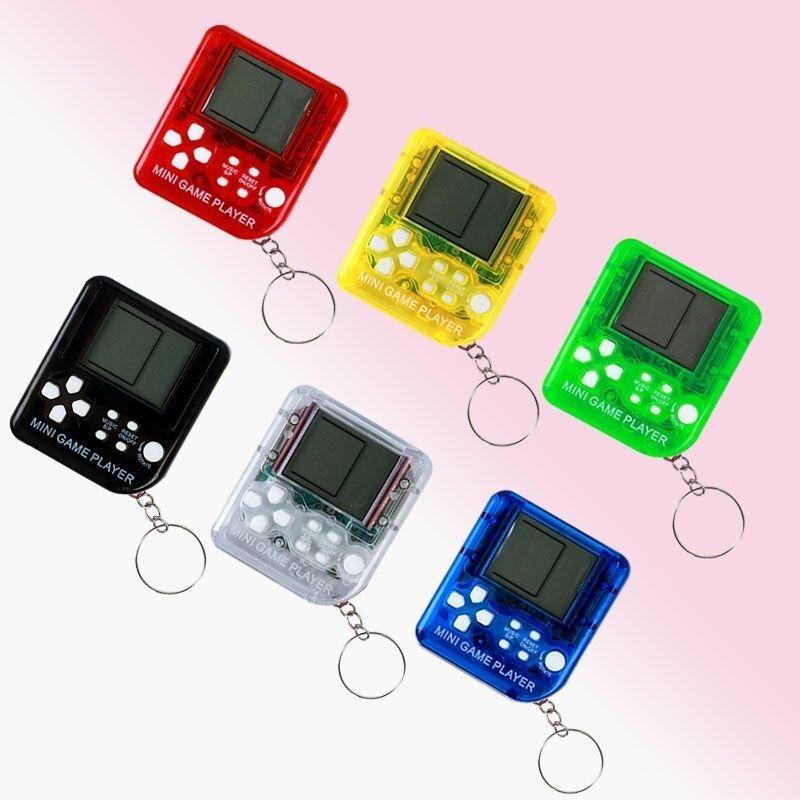 Mini Handheld Brick Game Console - 4 Pcs With Keychain Random Colour